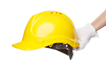 Construction helmet in the hand, isolated