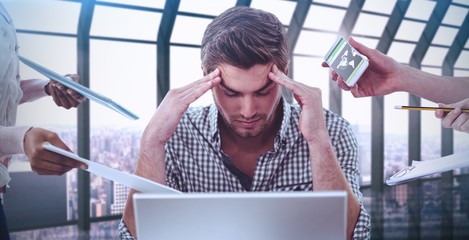 Wall Mural - Composite image of businessman stressed out at work