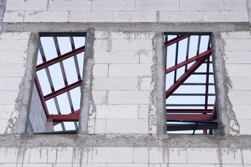 Canvas Print - window and white Concrete wall of New Home at construction site