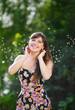 © timonko - beautiful woman with long hair in summer park
