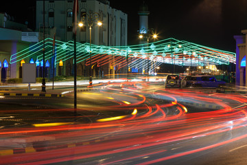 Fototapete - Street in Muscat decorated with lights