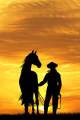 Poster - cowboy with horse at sunset