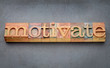 motivate word in letterpress wood type