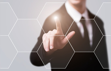 Wall Mural - businessman pressing button on virtual screens