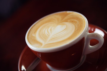 Canvas Print - Hot Latte Coffee in coffee shop on table wooden