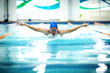 © jcfotografo - Young athletic man with butterfly swimming technique.