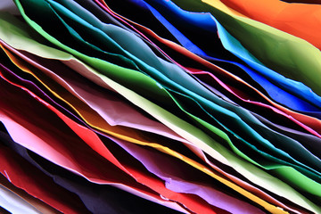 Sticker - crumpled color papers background