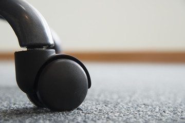 close-up of the roller of the chair in the meeting room