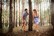 © yuliachupina - a young couple in love walking in the woods