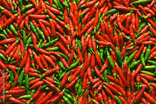 Nowoczesny obraz na płótnie Background image of red and green peppers.