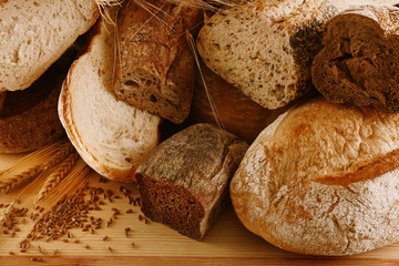 Assortment of fresh baked bread on the table, close-up