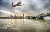 Fototapeta Londyn - Plane over London