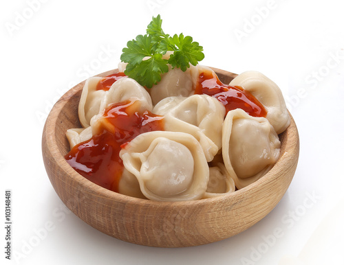 Naklejka dekoracyjna Dumplings in the wooden bowl