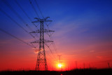 Fototapeta Łazienka - The silhouette of the evening electricity transmission pylon