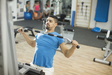 Young man training in the gym