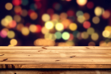 Wall Mural - empty wooden table for product placement or montage with focus to the table top, blurred bokeh backg