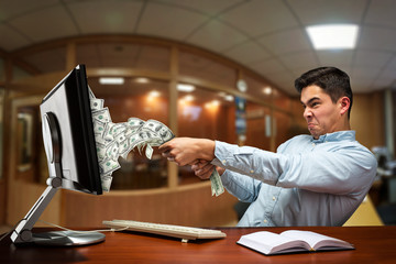 Businessman drawing out money