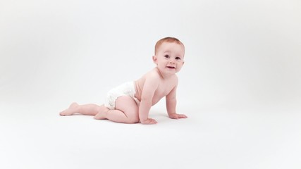 happy baby boy crawling