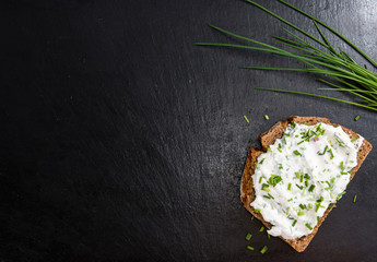 Wall Mural - Slice of Bread with fresh made Herb Curd