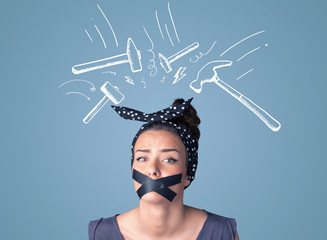 Wall Mural - Young woman with glued mouth and hammer marks