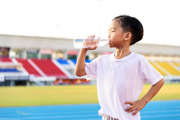 Boy and bottle of water