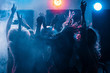 © lumenphotos - party at a nightclub, young people boys and girls dancing in a smoke