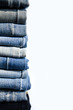 © oottoo008 - Stack jeans on white background.