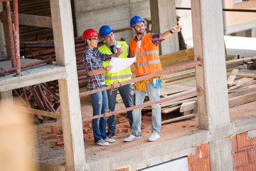 Wall Mural - Building constructers planning future building