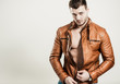 sexy man in leather jacket portrait