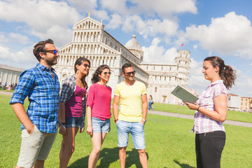 group of tourists in pisa, italy