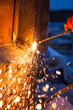 worker cutting steel board using metal torch