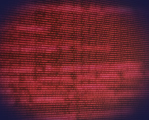 Abstract binary red code on digital screen