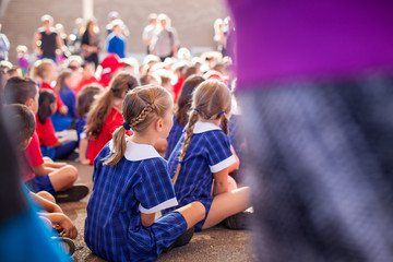 Poster - School kids at assembly - with copy space on the right