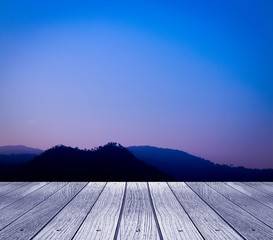 Wall Mural - sunset background with empty plank under for put your products.