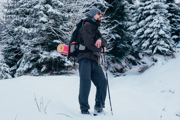 Wall Mural - man hiking in mountains