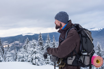 Wall Mural - man hiking in mountains