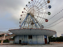 Abandoned Old Ferris Wheel Inside Chinese Amusement Park - Landscape Color Photo