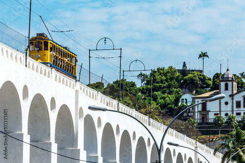 Yellow Train under the Lapa district in Rio de Janeiro, Brazil Poster