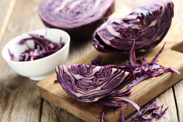 Wall Mural - Ripe red cabbage on a grey wooden table