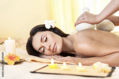 Fotografie, Obraz Young woman getting massage in Thai spa.
