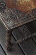 Old vintage wood dark table balinese style. Wood carving