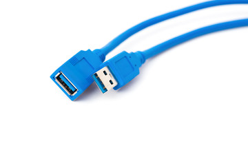 heads of a blue usb cable on a white background