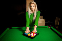 Charming Young Blonde Puts Balls In Triangle On Pool Table