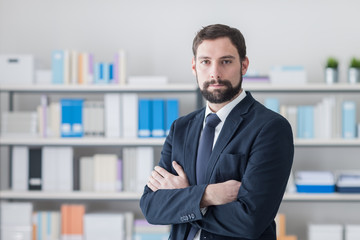 Wall Mural - Confident businessman in his office