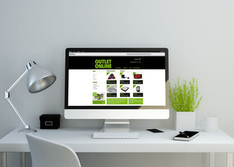 Wall Mural - modern clean workspace with online shop website on screen