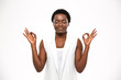 © Drobot Dean - Peaceful attractive african american young woman meditating and keeping calm