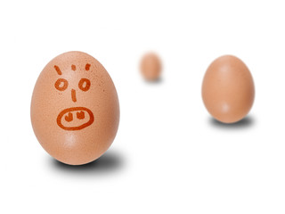 Brown eggs with faces drawn