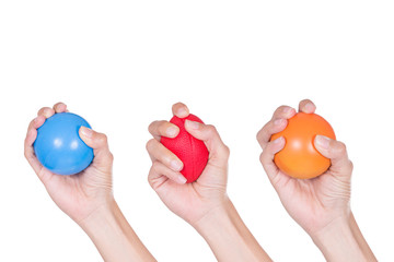 Hands of a woman squeezing a stress ball