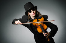 Woman Playing Classical Violin In Music Concept