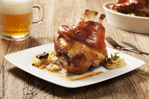 Tapeta ścienna na wymiar Roasted knuckle of pork with boiled cabbage, bread, horseradish